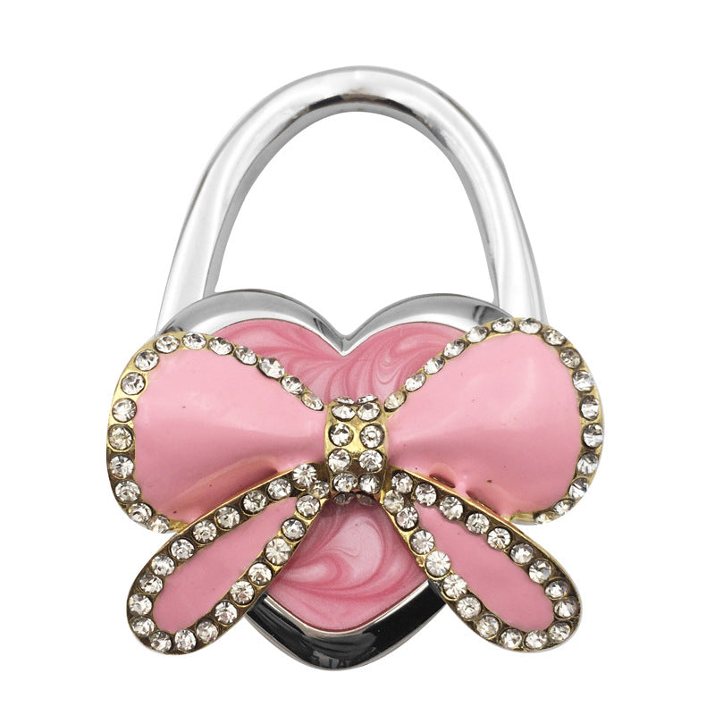 Wholesale Bow Hanging Creative and Practical Girl Bag Hook Folding Bag Hook At The Table